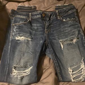 Dark wash American Eagle jeans with holes